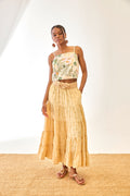 Model wearing NKN Nekane Riloru Yellow Long Linen Ruffled Skirt by nkn nekane, shop nkn nekane at Dotique