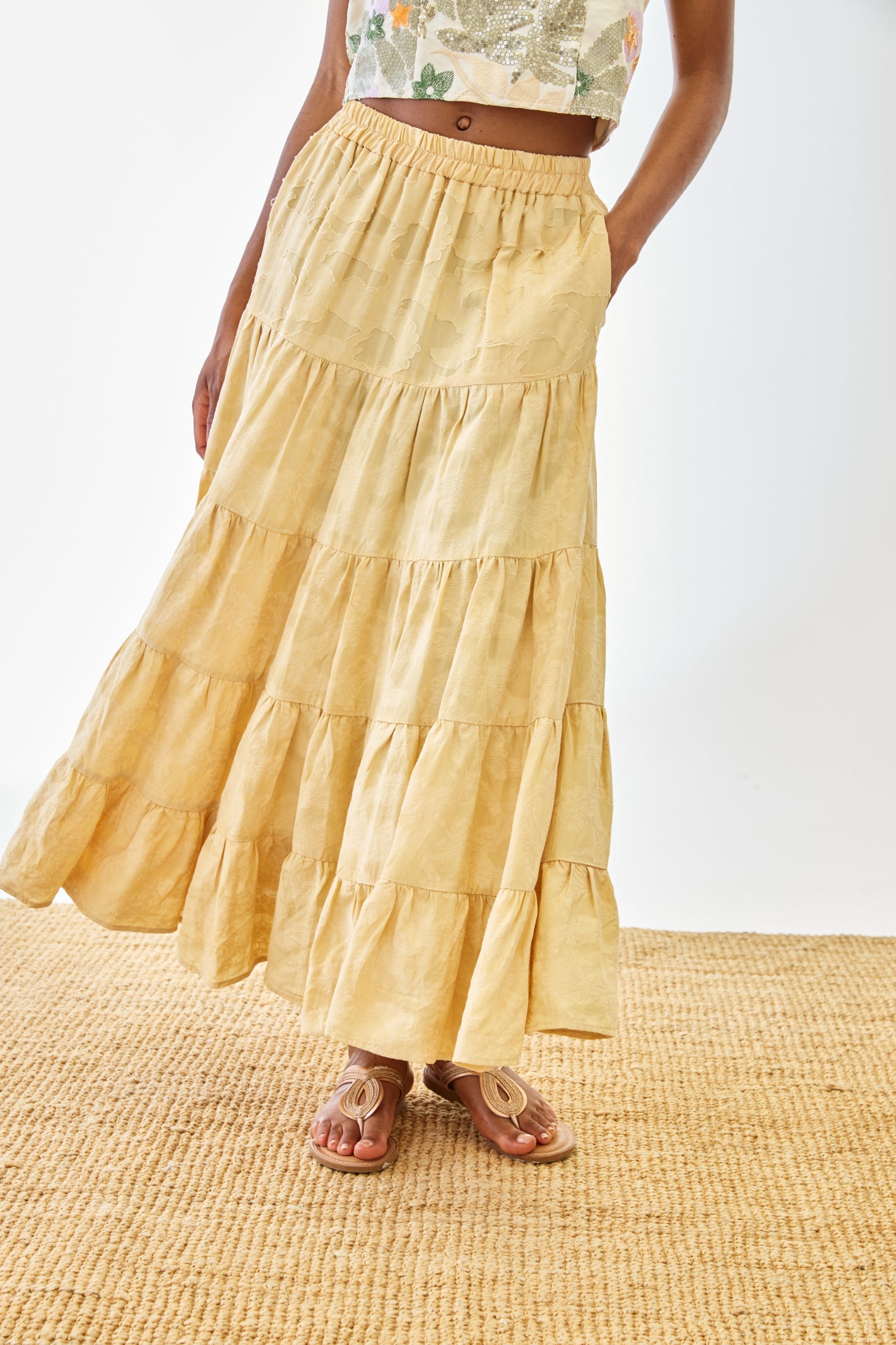 Woman wearing NKN Nekane Riloru Yellow Long Linen Ruffled Skirt by nkn nekane, shop nkn nekane at Dotique