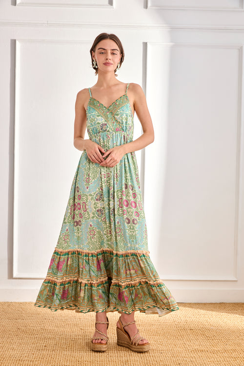 Model wearing NKN Nekane Jomi  Aqua Long Viscose Dress with Botanical Print by nkn nekane, shop nkn nekane at Dotique