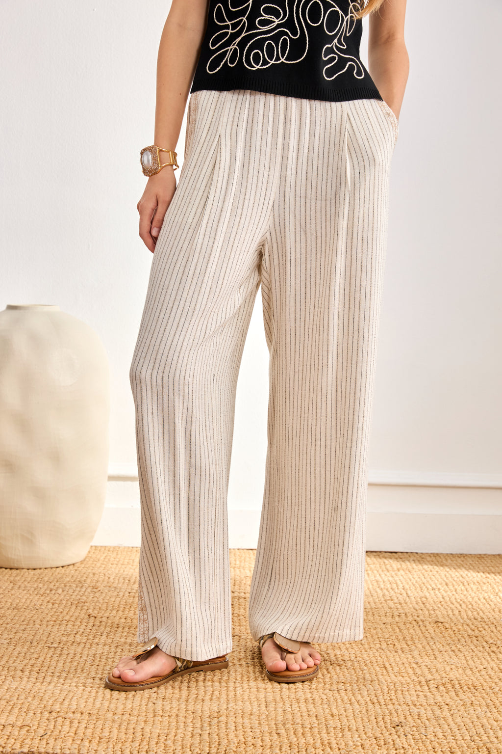 Front view of model wearing NKN Nekane Eos Ivory Linen Striped Trousers by nkn nekane, shop nkn nekane at Dotique