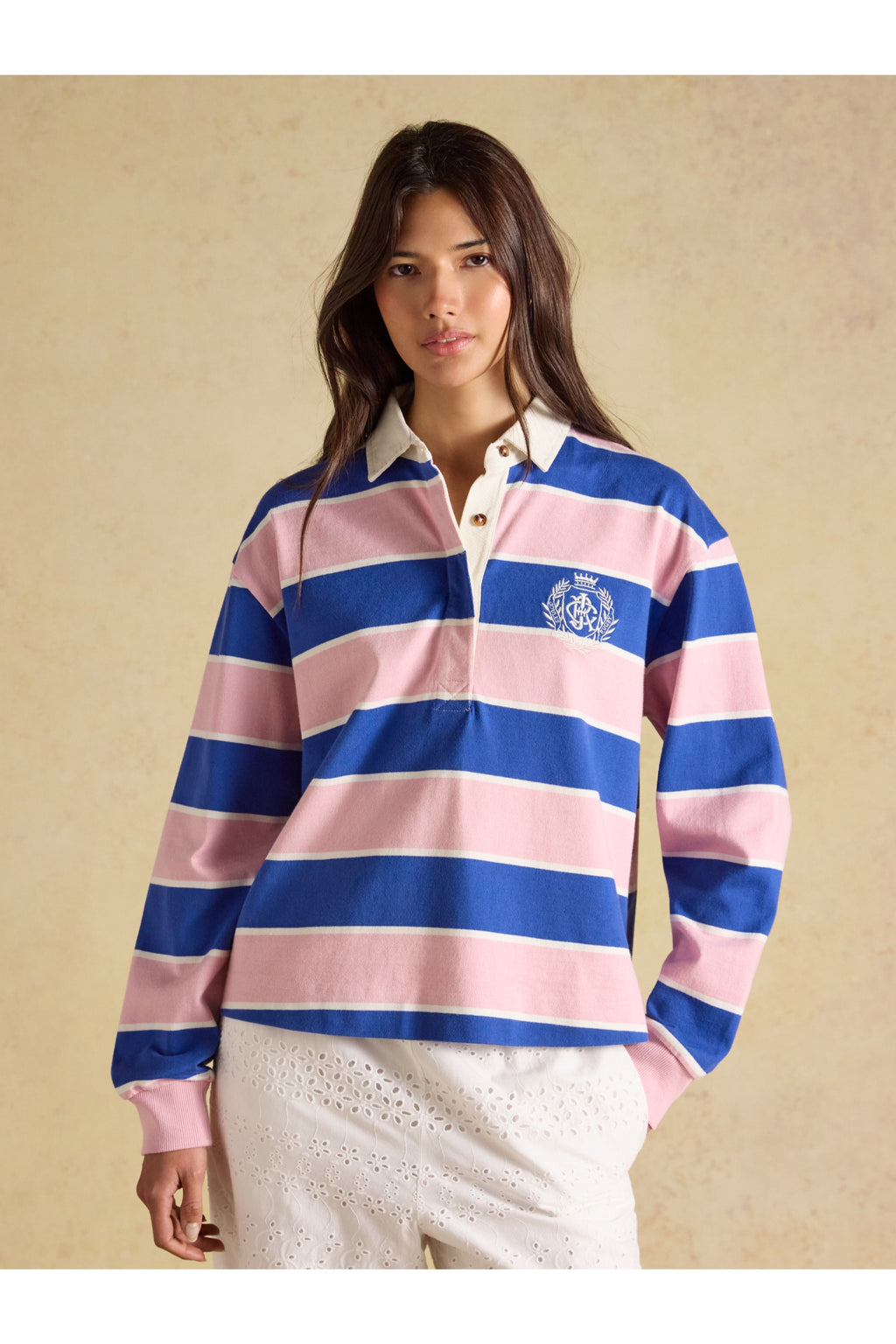 Model wearing Joules Lara Pink/Blue Stripe Top. Shop Joules at Dotique