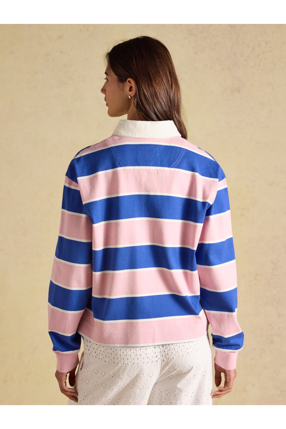 Joules Lara Pink/Blue Stripe Top worn from behind by a model. Shop Joules at Dotique