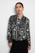 Shop the Bariloche 4011102 Vada Women's Shirt in Black at Dotique. A lightweight zip-front blouse with an elegant ivory floral print, perfect for effortless everyday and occasion styling.