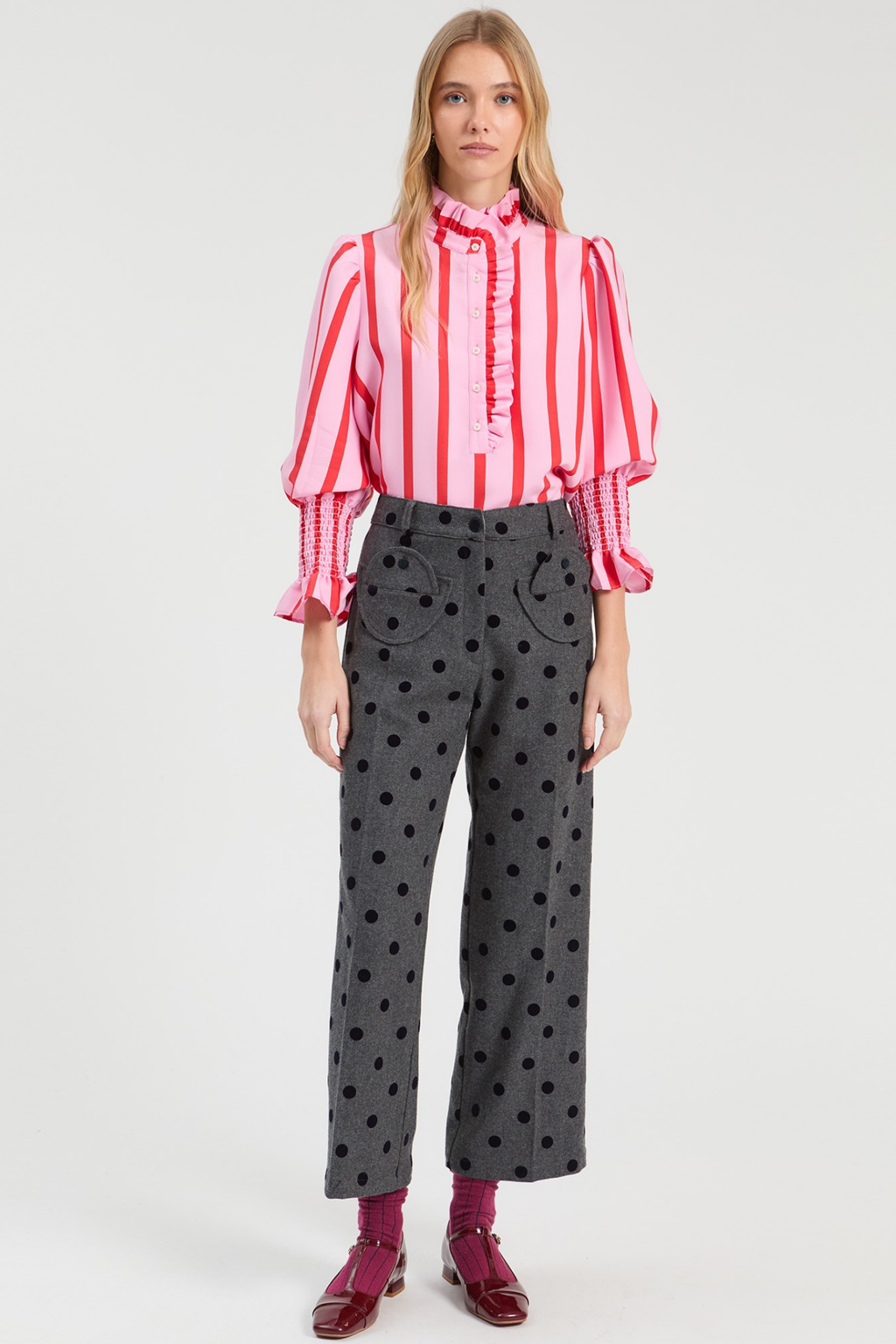 Shop the Vilagallo Pink & Red Striped Ruffle Shirt at Dotique. Made from a lightweight viscose blend with a frilled neckline, shirred cuffs and bold striped design.