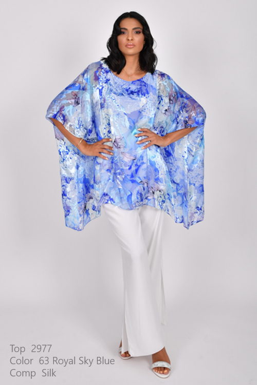 Model wearing Allison 2977 Royal Sky Blue Silk Overlay Top by Allison in flowing blue print, shop Allison at Dotique for elegant layering.