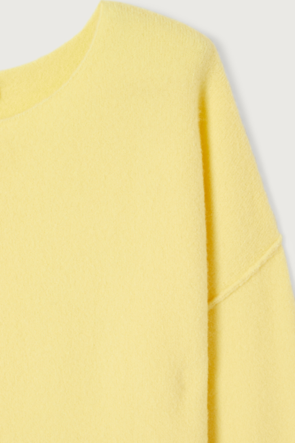 Shop the American Vintage Damsville Jumper in Beurre Chine at Dotique. A luxuriously soft wool blend knit with a relaxed fit in a fresh buttery yellow melange.