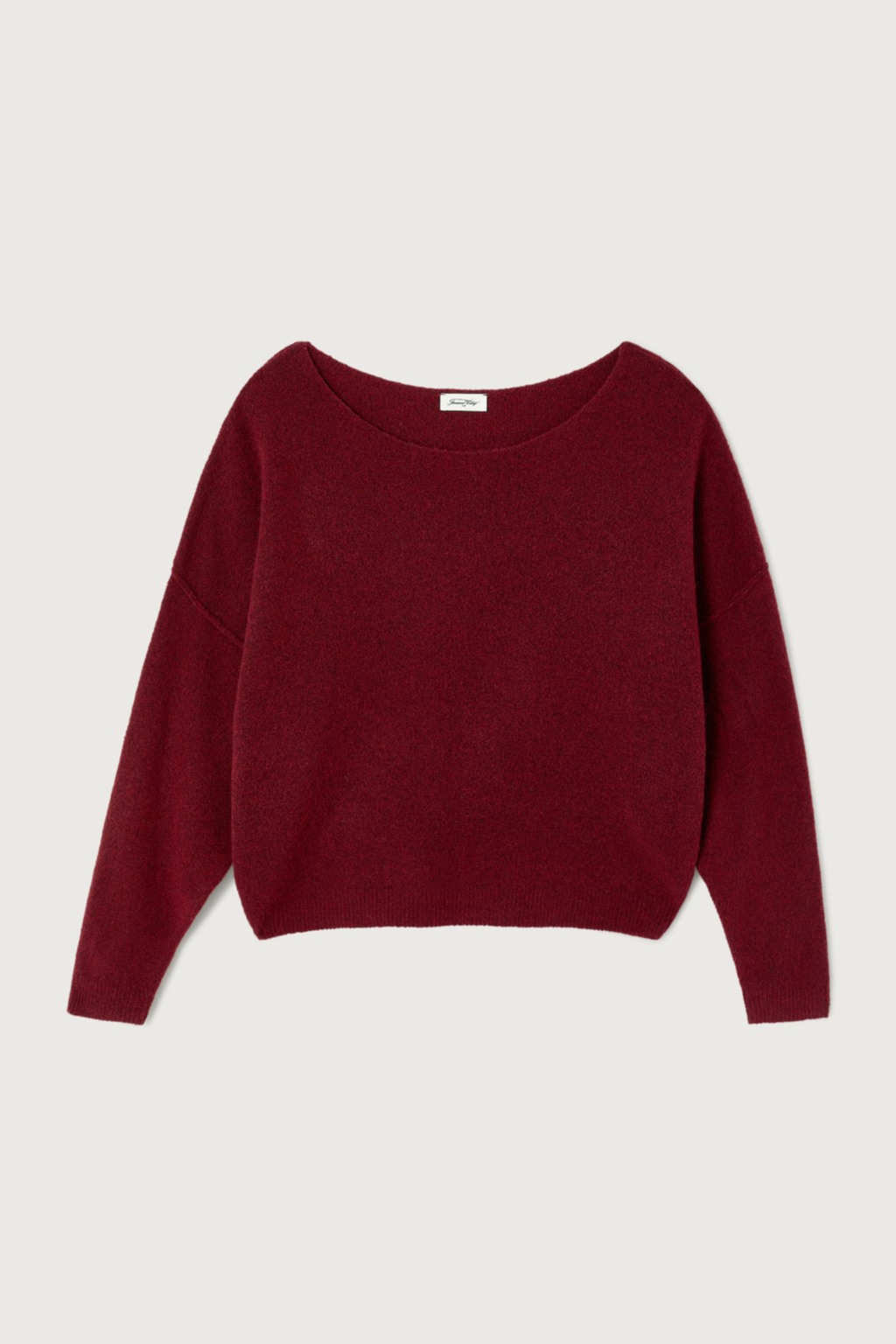 Shop the American Vintage Damsville Jumper in Cerisier Chine at Dotique. A luxuriously soft wool blend knit with a relaxed fit, boat neckline and rich cherry red melange colour.