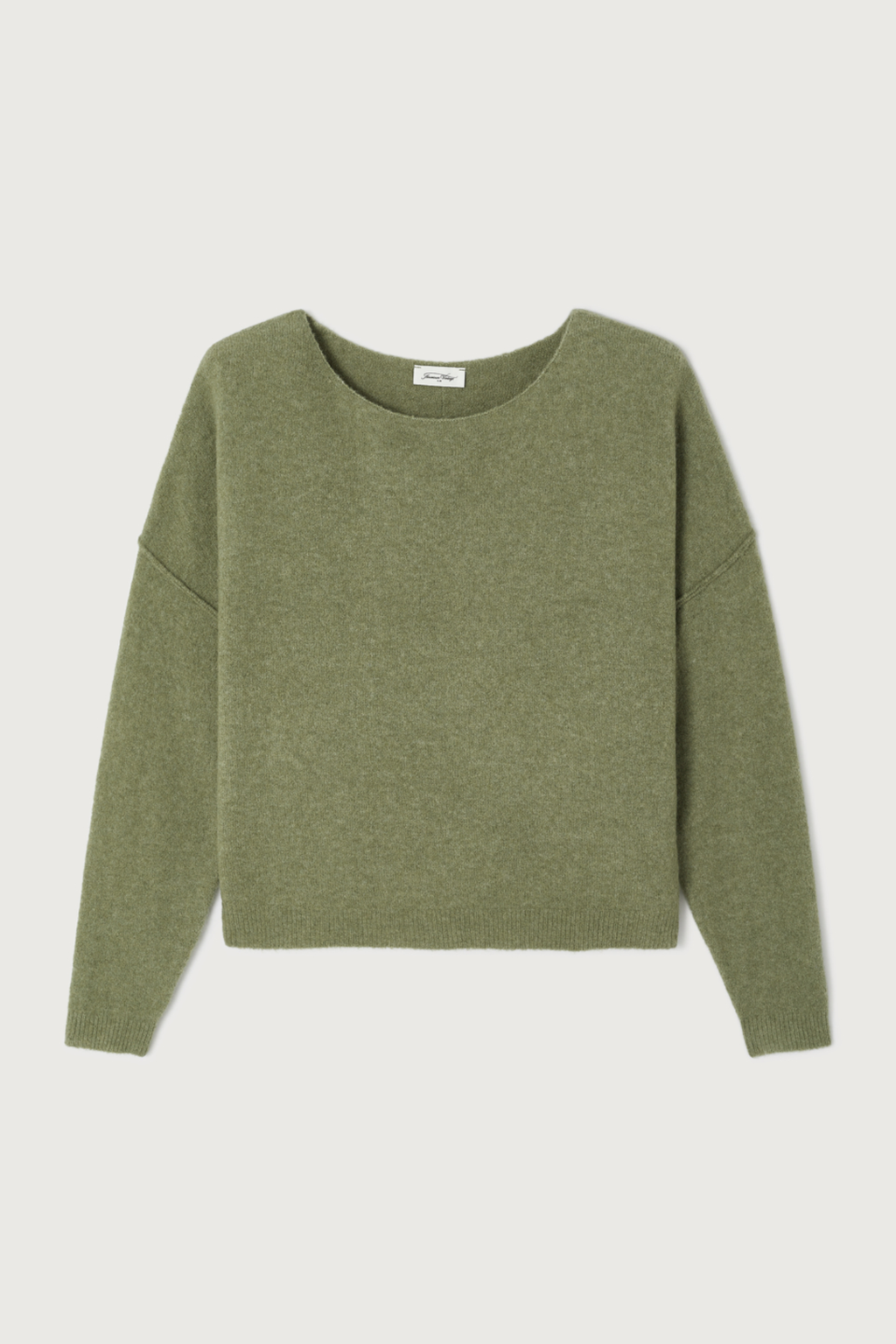Shop the American Vintage Damsville Jumper in Lezard Chine at Dotique. A luxuriously soft wool blend knit in a relaxed fit with a timeless khaki green melange finish.