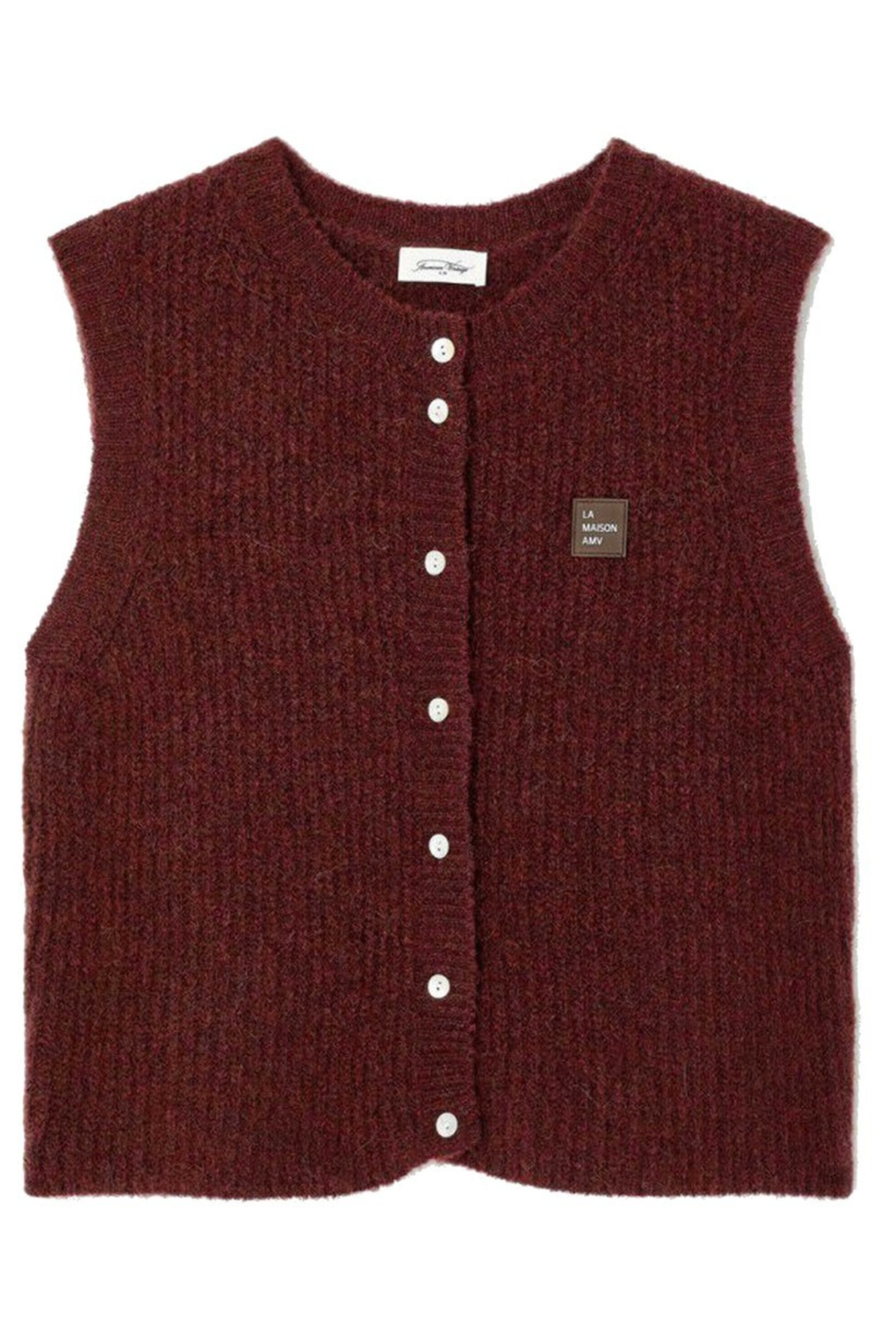 Shop the American Vintage East Knitted Waistcoat in Acerola Chine at Dotique. A soft alpaca blend knitted waistcoat with a relaxed fit, button front and rich burgundy melange colour.