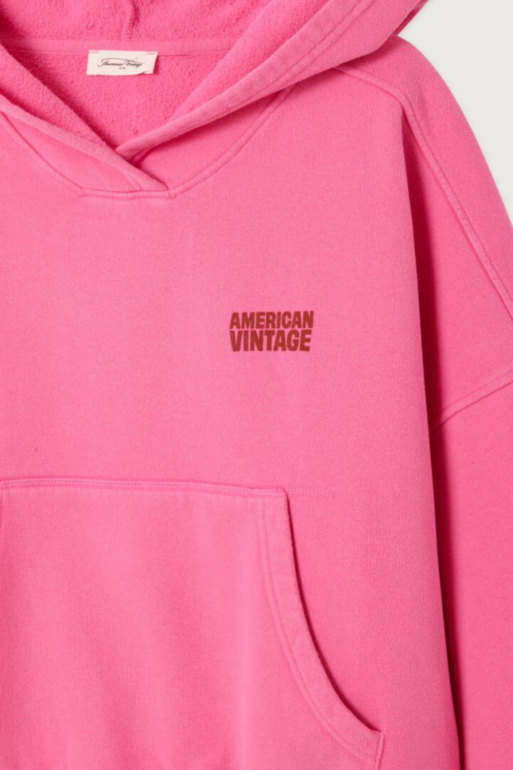 Close-up of pink American Vintage Plizzy Cotton Hoodie – Petunia Vintage with logo, shop American Vintage at Dotique
