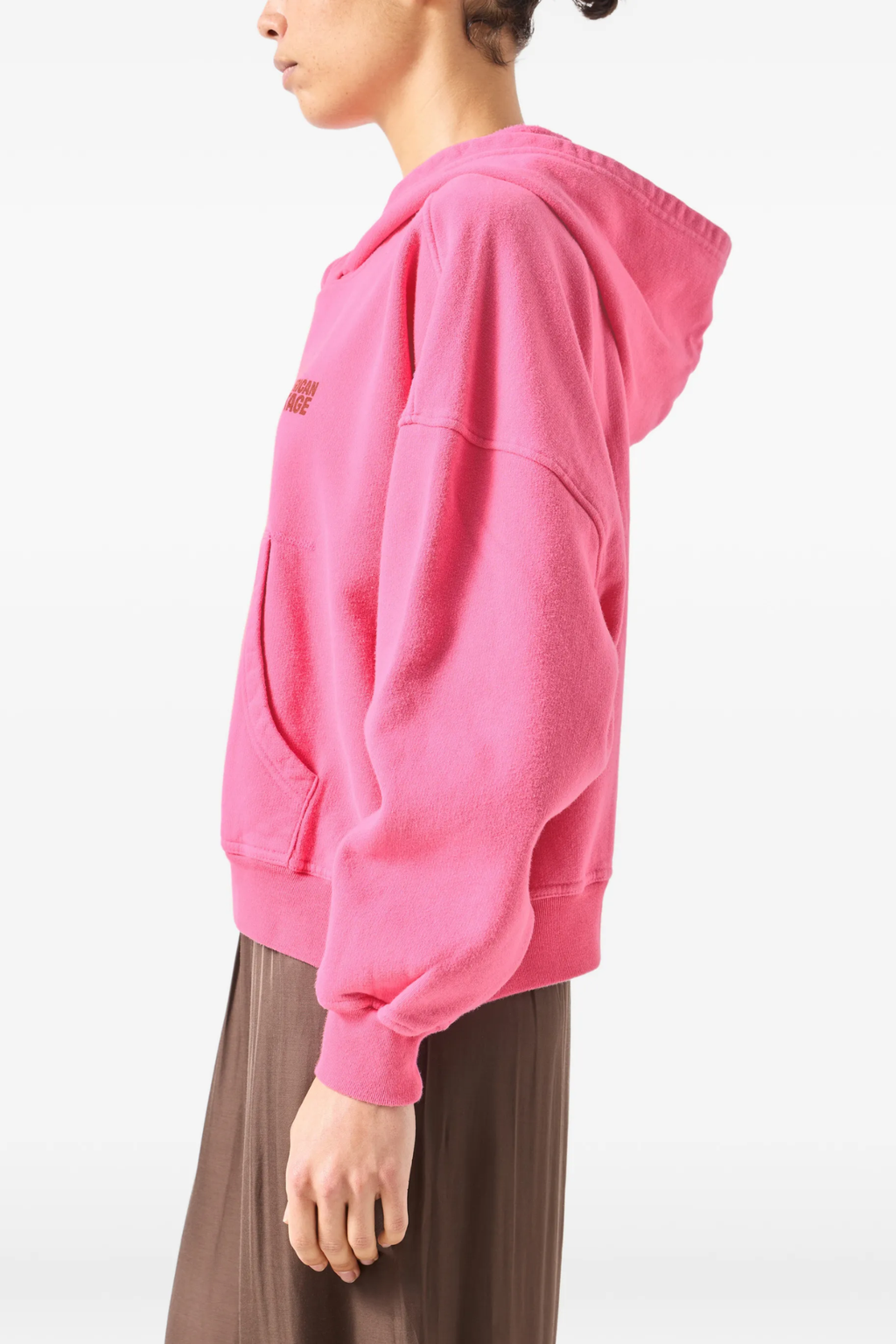 Side view of American Vintage Plizzy Cotton Hoodie – Petunia Vintage in bright pink, shop American Vintage at Dotique