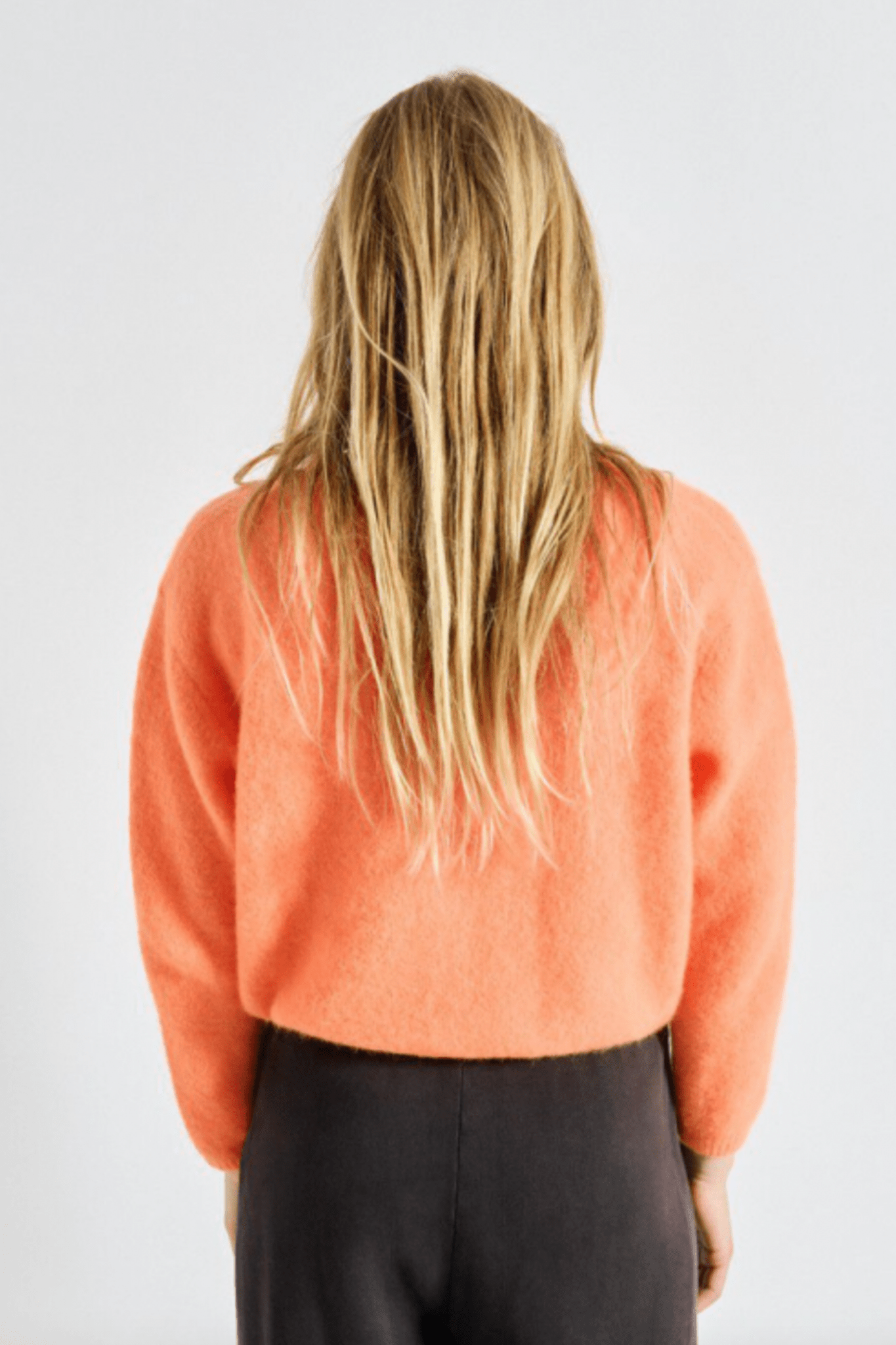 American Vintage Vitow cardigan in Carotte Fluo Chine with round neck and pearl buttons at Dotique
