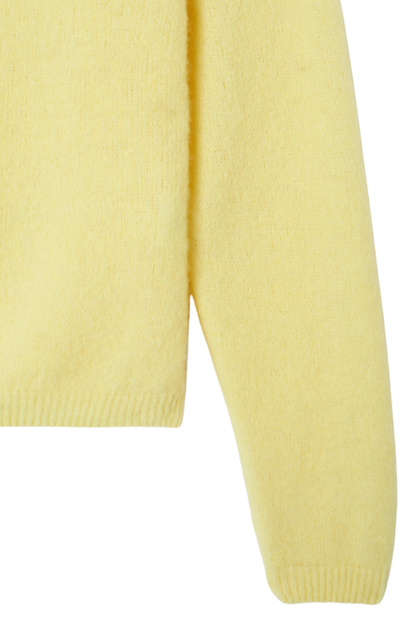 Shop the American Vintage Vitow Cardigan in Citronnier Chine at Dotique. A luxuriously soft alpaca and wool blend cardigan in a fresh yellow hue with a relaxed fit.
