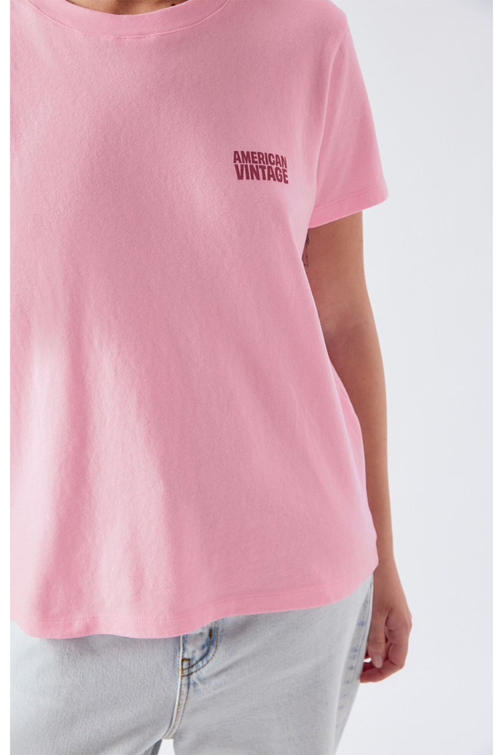 Close-up of a soft pink American Vintage Ykobow Cotton T-Shirt – Bon Bon with small logo detail, shop American Vintage at Dotique.
