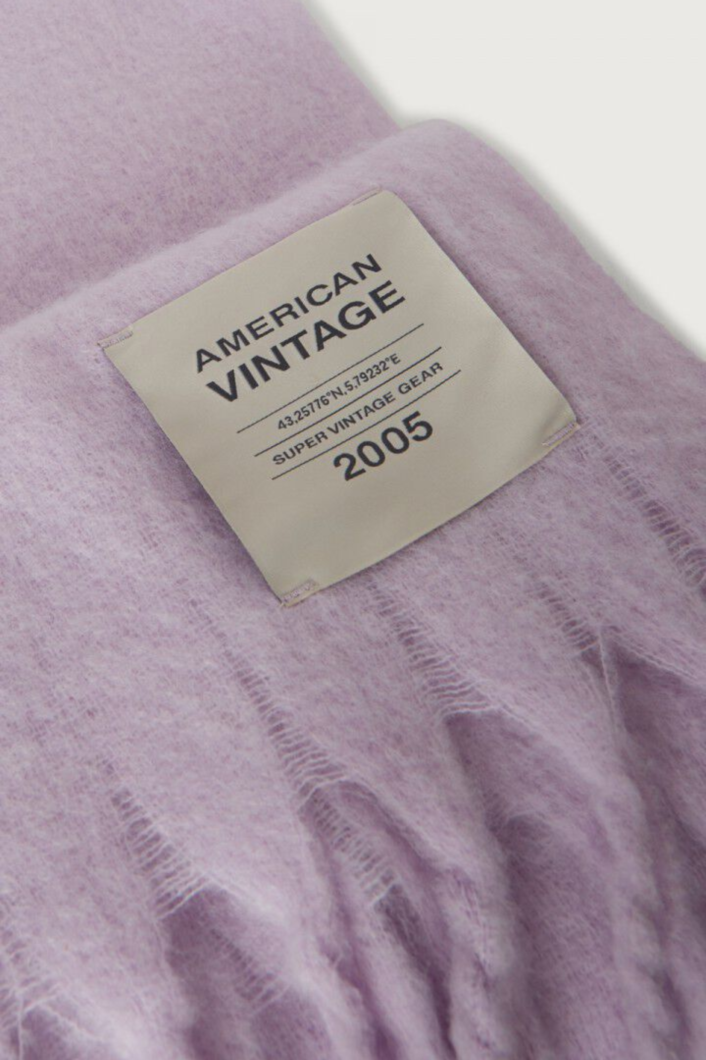 Shop the American Vintage Zinaco Scarf in Lilac at Dotique. A soft brushed scarf with fringed edges in a beautiful pastel lilac shade for effortless everyday styling.