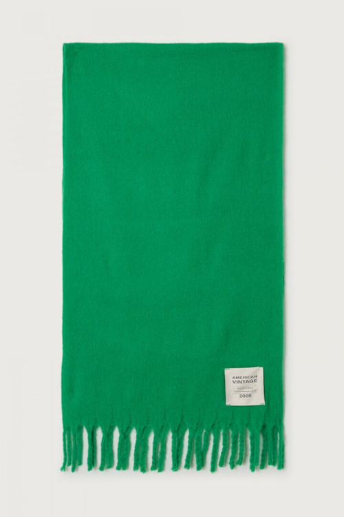 Shop the American Vintage Zinaco Scarf in Mint at Dotique. A soft brushed scarf with fringed edges in a vibrant green shade for effortless everyday styling.