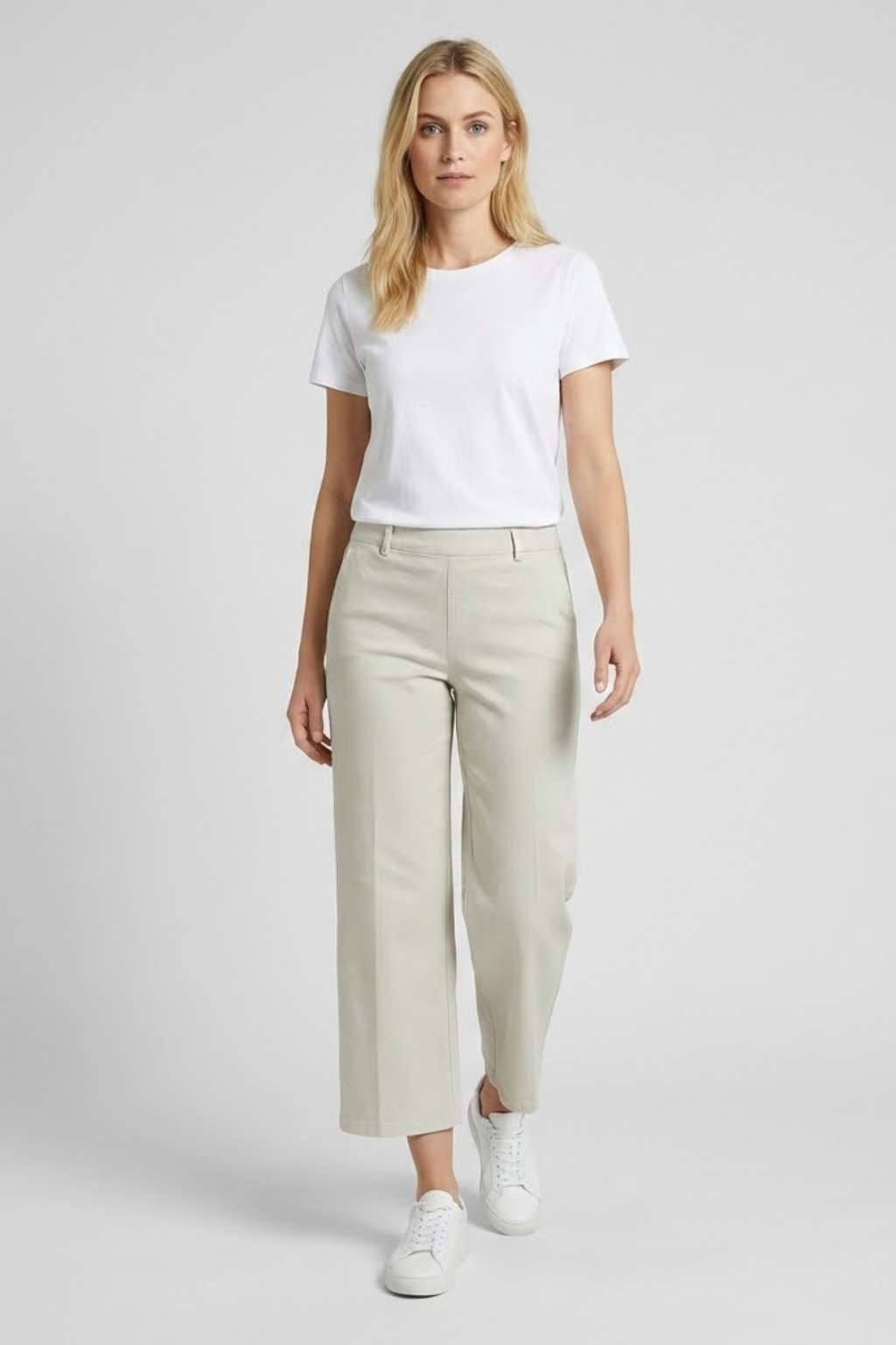 Model wearing Anna Montana 1045 Mila Wide Flexi Milano Jeans Leinen in light beige wide-leg style paired with a white tee by Anna Montana, shop Anna Montana at Dotique.