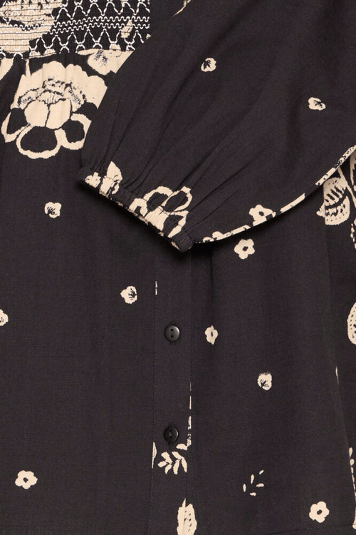 Atelier Rêve IRTULLA black cotton blouse with pink floral design at Dotique

