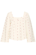 Lightweight cotton blouse by Atelier Rêve in birch white with delicate floral print. Easy, feminine and perfect for everyday wear. Shop at Dotique.