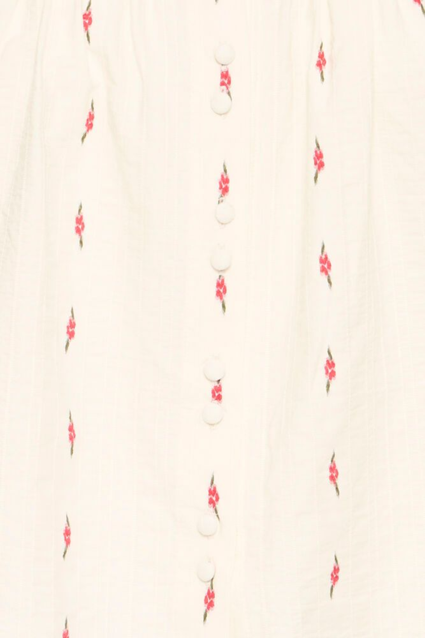 Lightweight cotton blouse by Atelier Rêve in birch white with delicate floral print. Easy, feminine and perfect for everyday wear. Shop at Dotique.