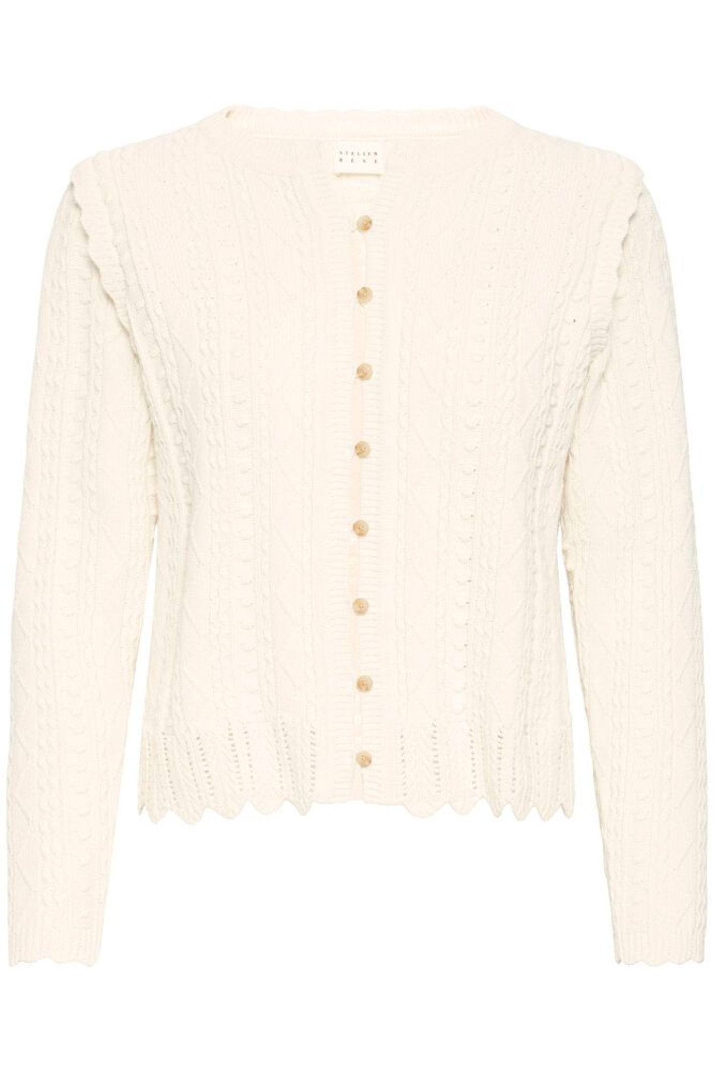 Soft cotton cardigan by Atelier Rêve in a classic birch shade. Easy to layer over dresses and tees for everyday wear. Shop at Dotique.