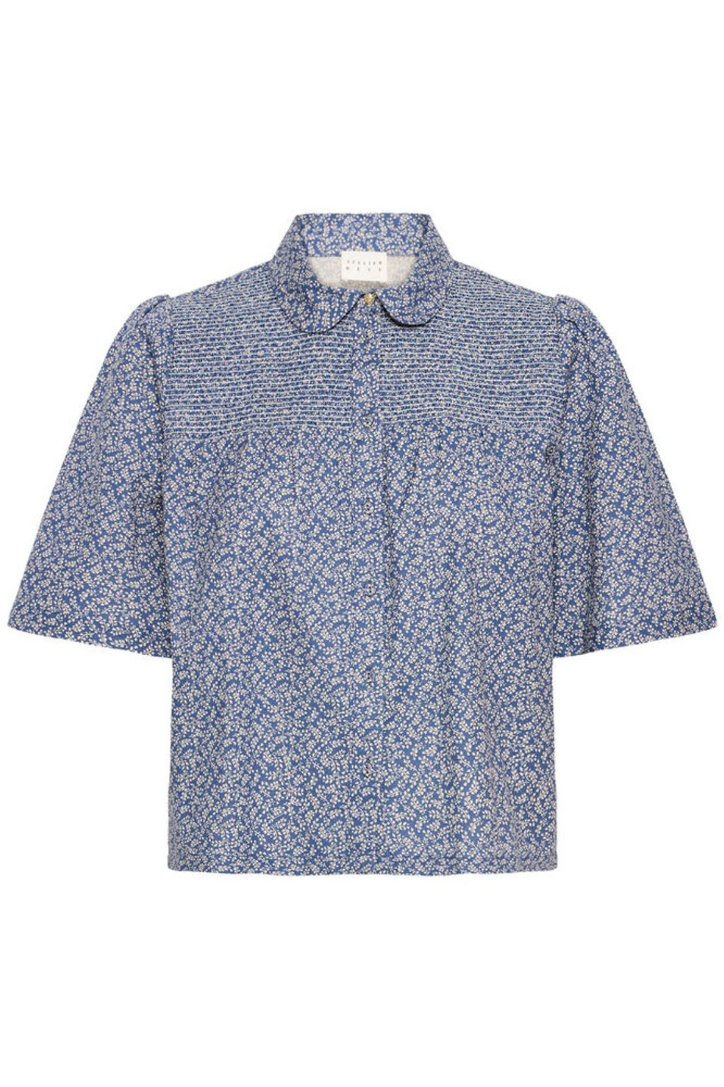 Lightweight cotton linen shirt by Atelier Rêve with a soft blue Odessa print. Easy loose fit with short sleeves. Shop now at Dotique.