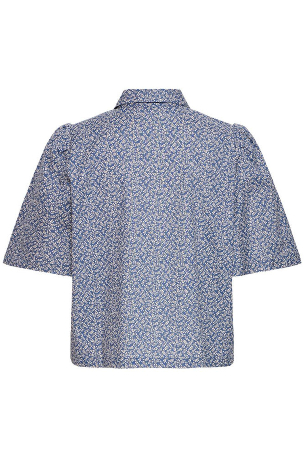 Lightweight cotton linen shirt by Atelier Rêve with a soft blue Odessa print. Easy loose fit with short sleeves. Shop now at Dotique.
