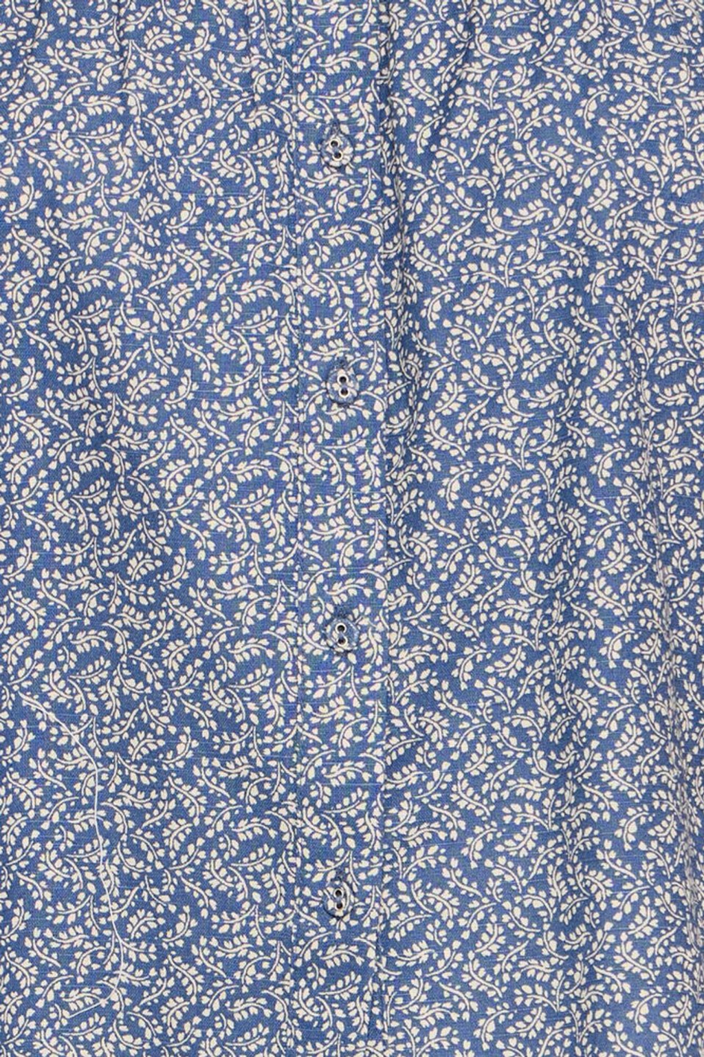 Lightweight cotton linen shirt by Atelier Rêve with a soft blue Odessa print. Easy loose fit with short sleeves. Shop now at Dotique.