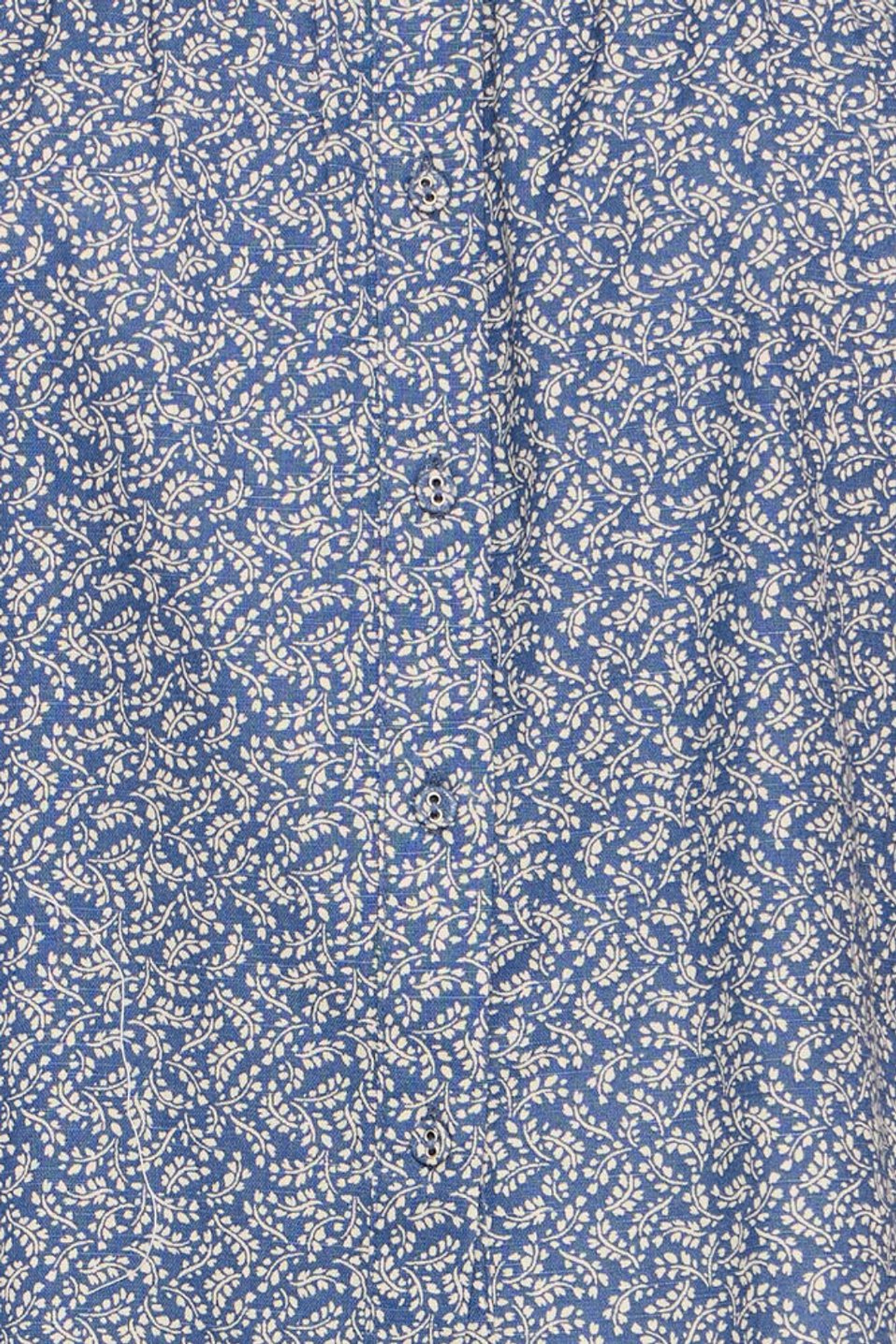 Lightweight cotton linen shirt by Atelier Rêve with a soft blue Odessa print. Easy loose fit with short sleeves. Shop now at Dotique.