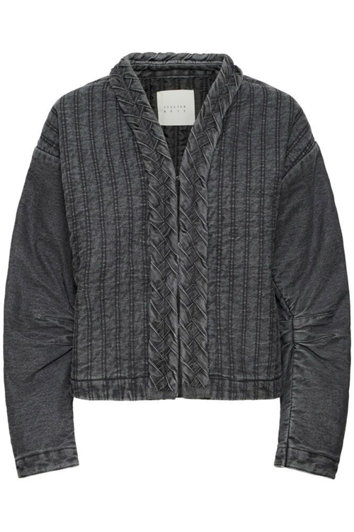 Soft grey denim jacket by Atelier Rêve. Made from 100% cotton with a relaxed fit. Easy to layer and wear year-round. Shop at Dotique.