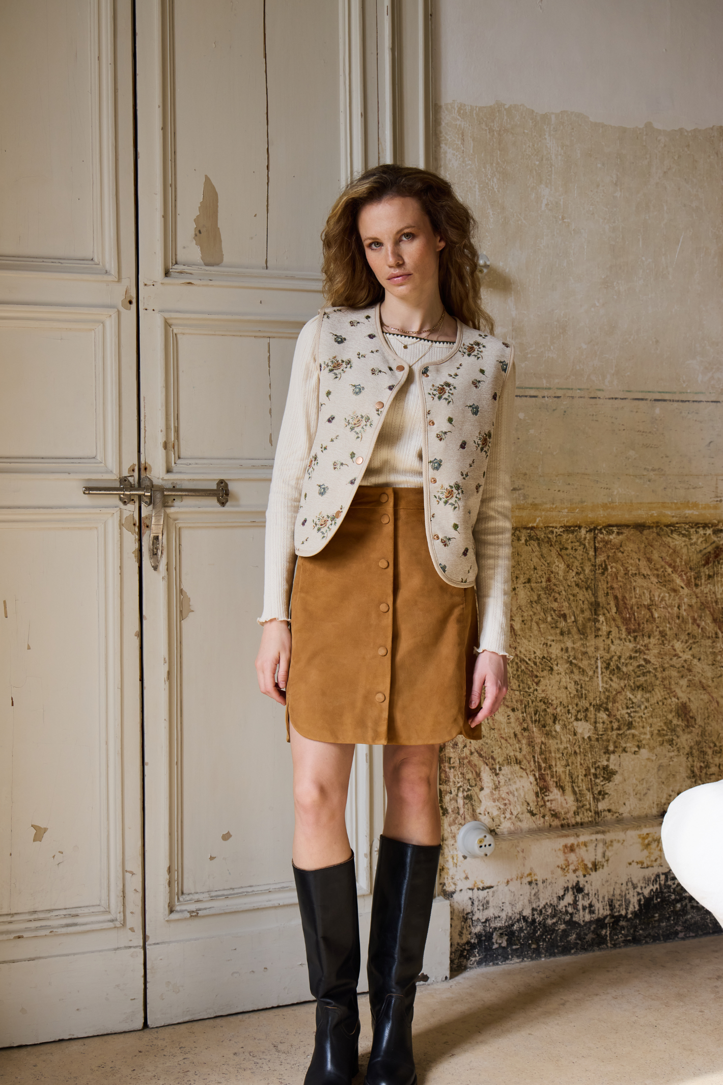 Atelier Rêve Irtambourine jacquard floral waistcoat with a loose, cropped fit. A beautiful layering piece to elevate everyday outfits. Shop at Dotique.