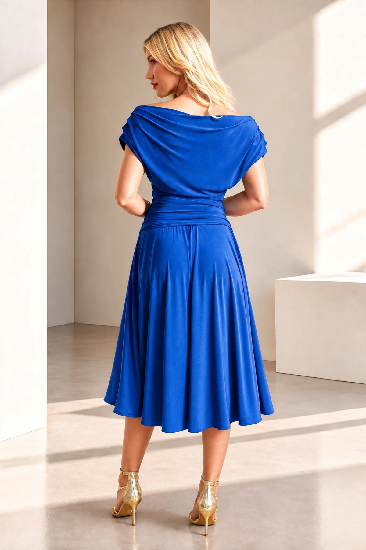 Atom Label Carbon Bardot Tea Length Dress – Cobalt Bue by ATOM LABEL blue dress back view. Shop ATOM LABEL at Dotique.