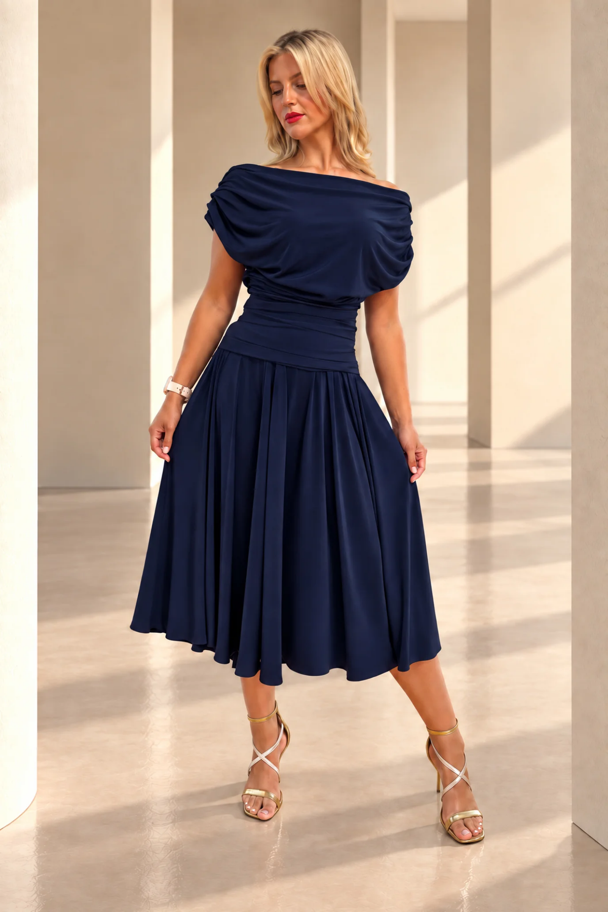Atom Label Carbon Bardot Tea Length Dress – Navy by ATOM LABEL model wearing a navy dress You can Shop ATOM LABEL at Dotique