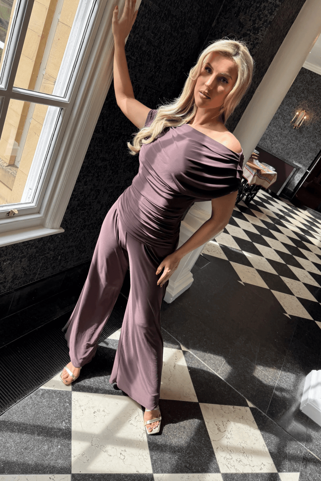 Atom Label Carbon Jumpsuit in Chocolate – off-shoulder wide-leg jumpsuit in stretch jersey, AW25 collection at Dotique.