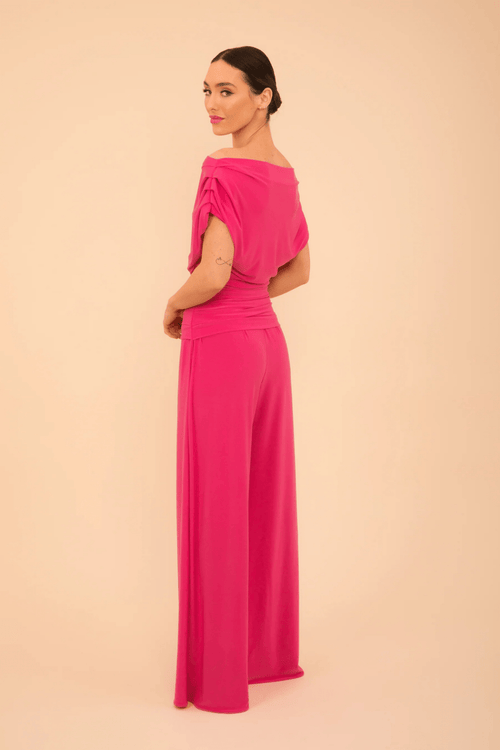 Model wearing ATOM LABEL Carbon Jumpsuit in Hot Pink by ATOM LABEL, shop the vendor at Dotique for stylish fashion.