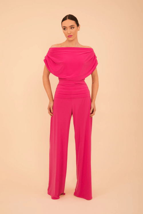 Model wearing ATOM LABEL Carbon Jumpsuit in Hot Pink by ATOM LABEL, shop ATOM LABEL at Dotique for stylish fashion.