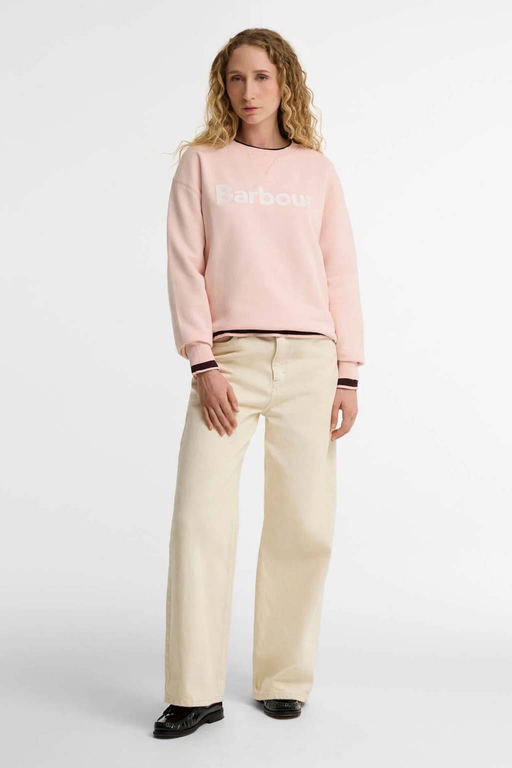 Barbour Hartland Logo Blush Pink Sweatshirt worn by model. Shop Barbour at Dotique
