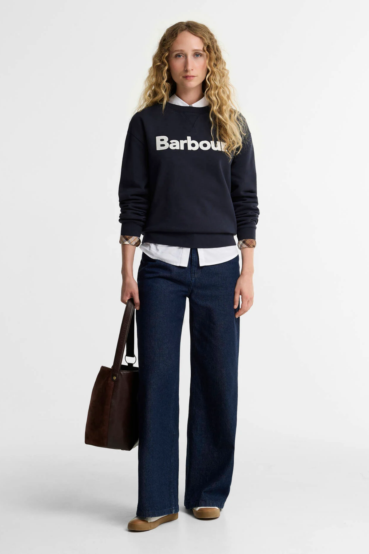 Barbour Hartland Logo Dark Navy Sweatshirt by Barbour worn with jeans Shop Barbour at Dotique