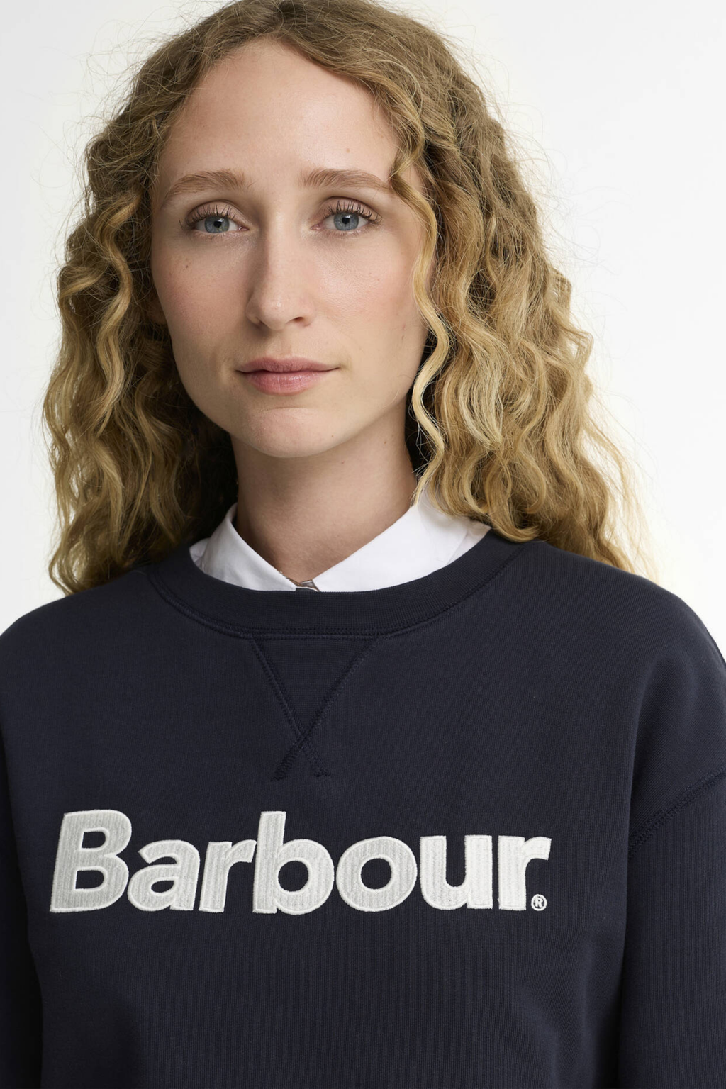 Barbour Hartland Logo Dark Navy Sweatshirt worn by a model Shop Barbour at Dotique