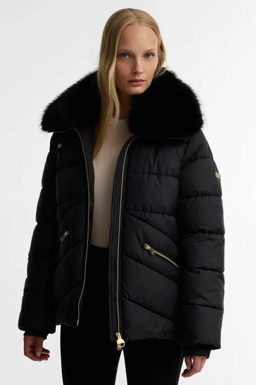 Barbour International Cyrus Puffer Jacket Black LQU1938 on model. Shop Barbour International at Dotique