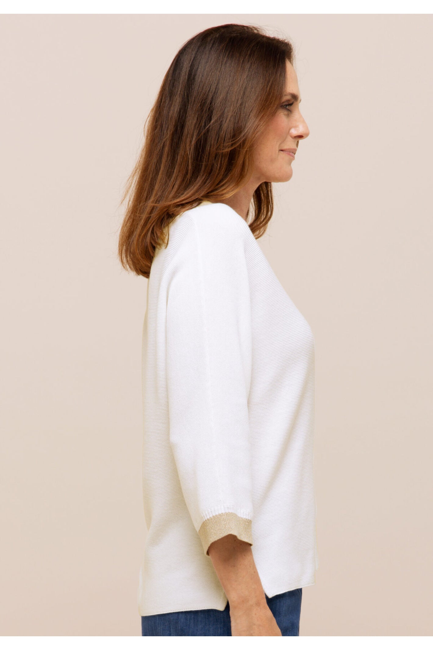 Side profile of model wearing Bianca 78005 Dita Strick Ivory Jumper by bianca, shop bianca at Dotique
