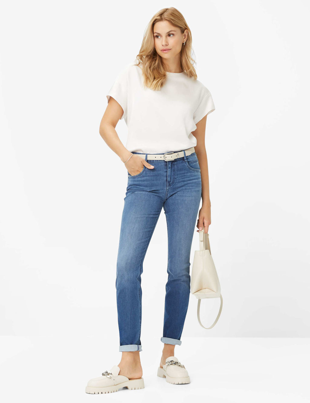 Woman wearing Brax Shakira 706000 9987920 27 Used Stone Blue Slim Fit Jeans by Brax, shop Brax at Dotique.