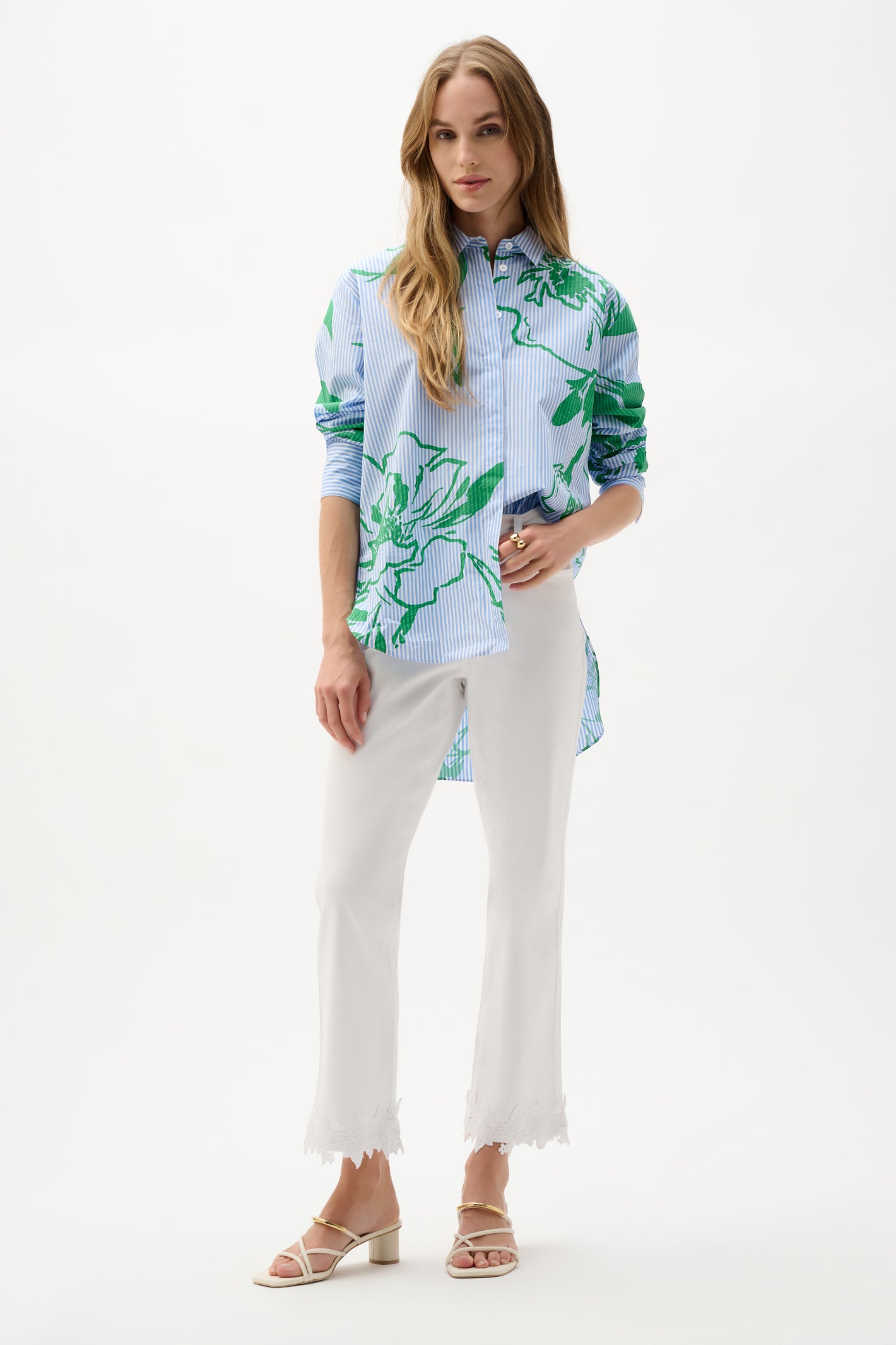 Model wearing Joseph Ribkoff Cotton Stripe Floral Print Boxy Blouse 262951 in blue and green floral design by Joseph Ribkoff, shop Joseph Ribkoff at Dotique.