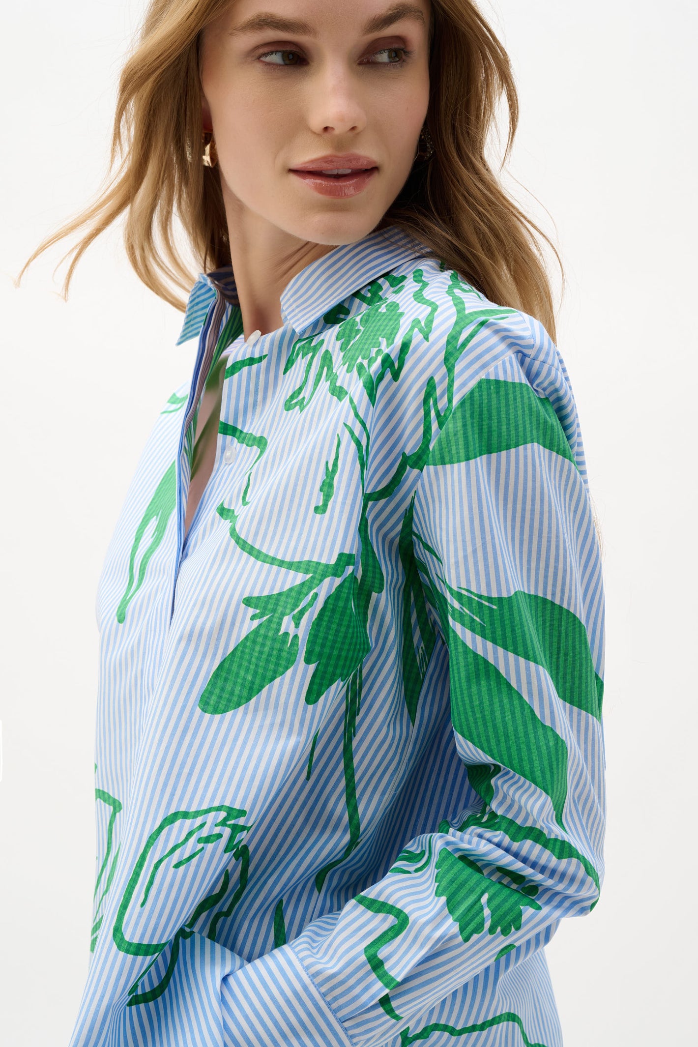 Model wearing Joseph Ribkoff Cotton Stripe Floral Print Boxy Blouse 262951 in blue and green by Joseph Ribkoff, shop Joseph Ribkoff at Dotique.