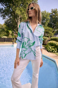 Model wearing Joseph Ribkoff Cotton Stripe Floral Print Boxy Blouse 262951 in blue and green by Joseph Ribkoff, shop Joseph Ribkoff at Dotique.