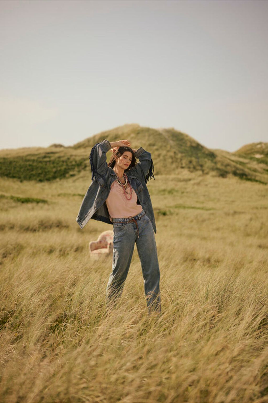 Model standing in field wearing Cream 10611224 CRanna Peach Blush Lace Vest Top by Cream Shop the Vendor at Dotique