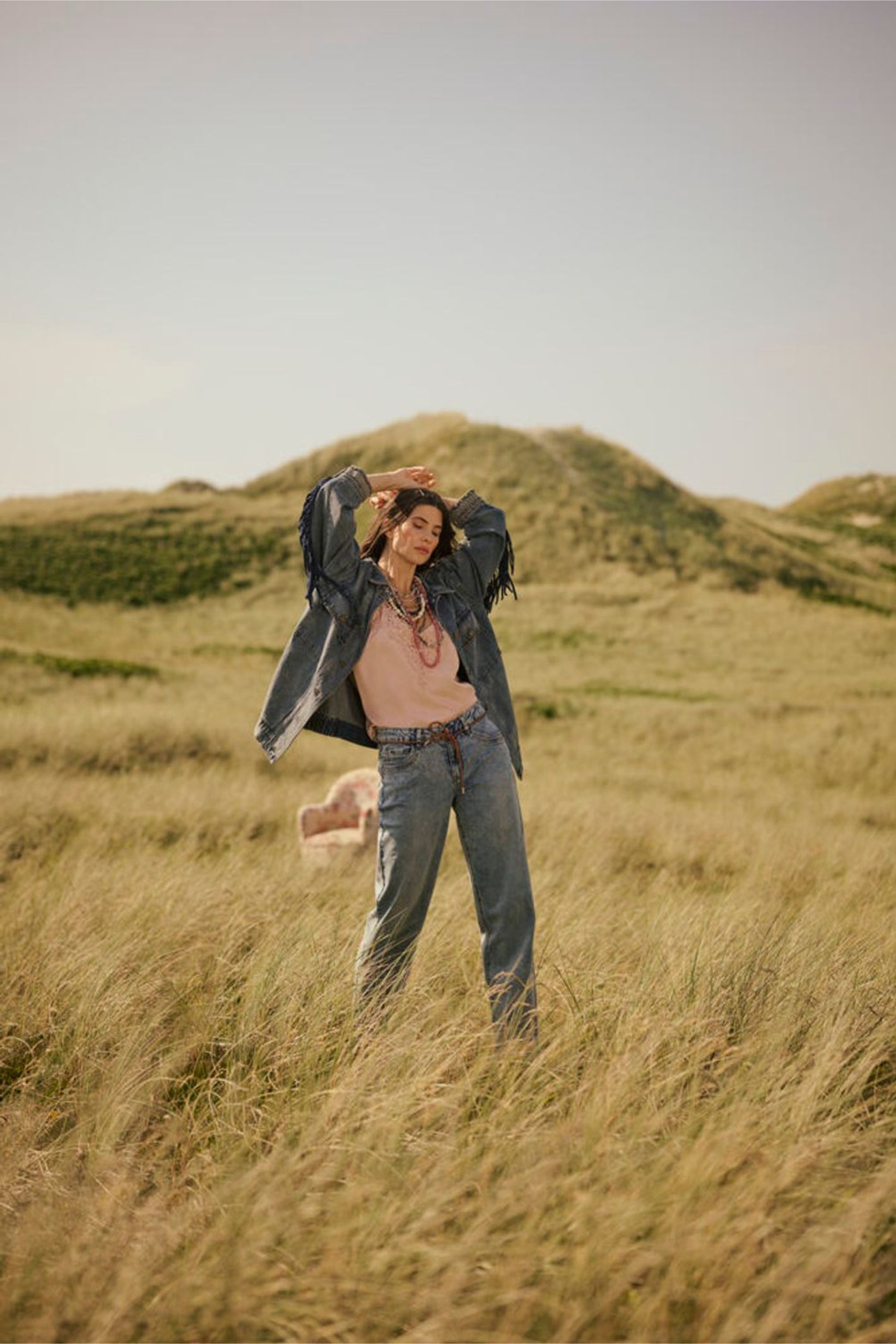 Model standing in field wearing Cream 10611224 CRanna Peach Blush Lace Vest Top by Cream Shop the Vendor at Dotique