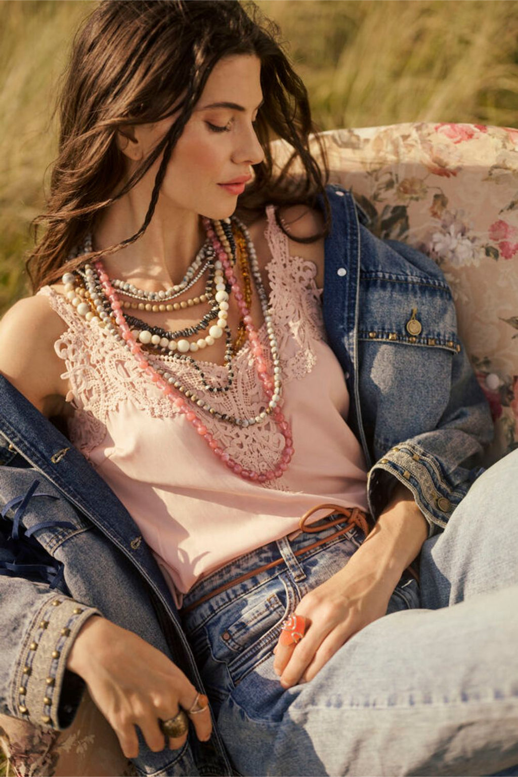 Model wearing Cream 10611224 CRanna Peach Blush Lace Vest Top by Cream layered with denim jacket, shop the vendor at Dotique