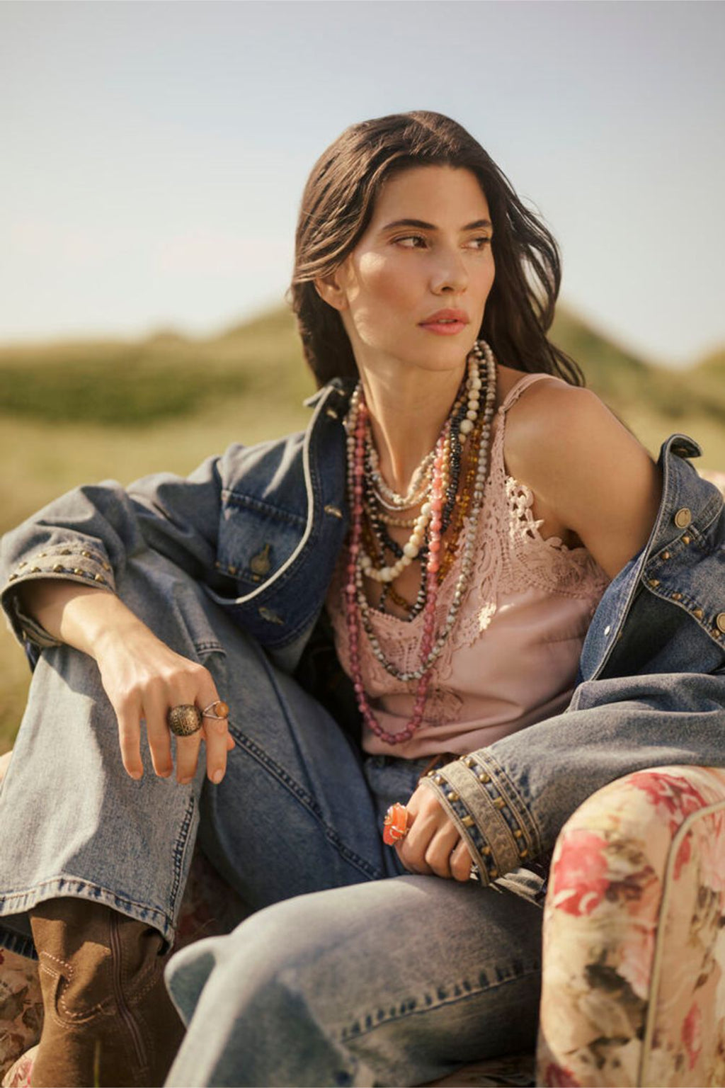 Model seated wearing Cream 10611224 CRanna Peach Blush Lace Vest Top paired with denim jacket by Cream Shop the Vendor at Dotique