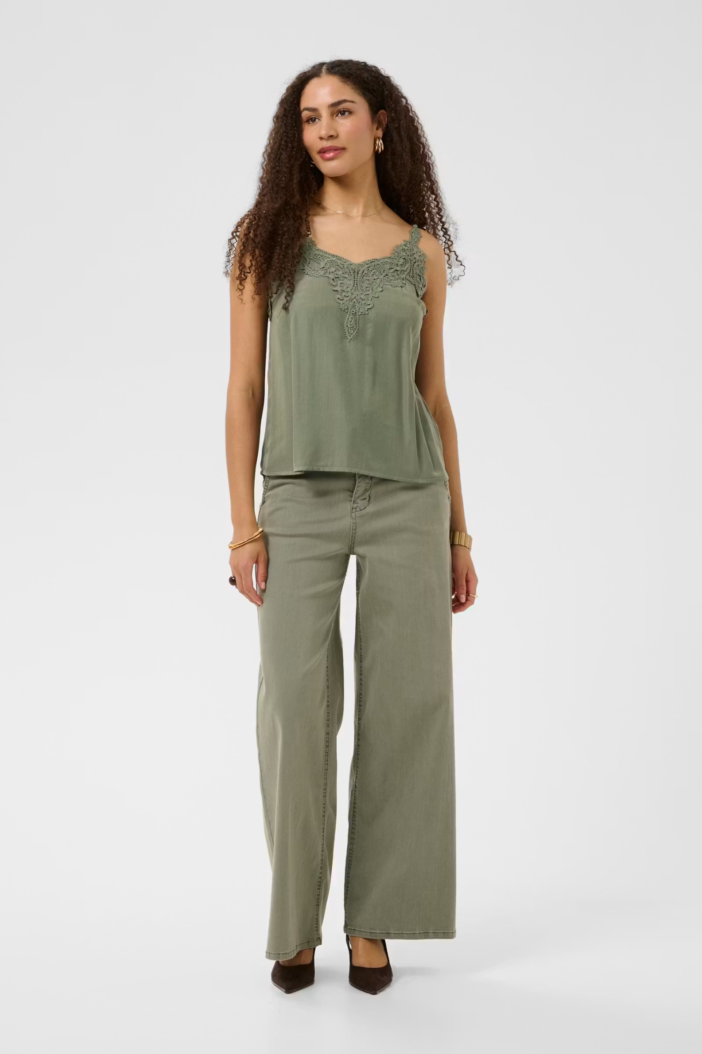 Shop the Cream CRAnna Top in Java at Dotique. A lace-trim V-neck cami with adjustable straps and a flattering fit, perfect for layering or wearing alone.